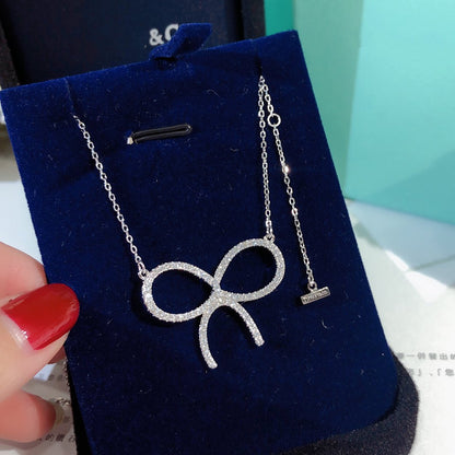 [Marins]CLAW SET RHODIUM PLATED BOW NECKLACE