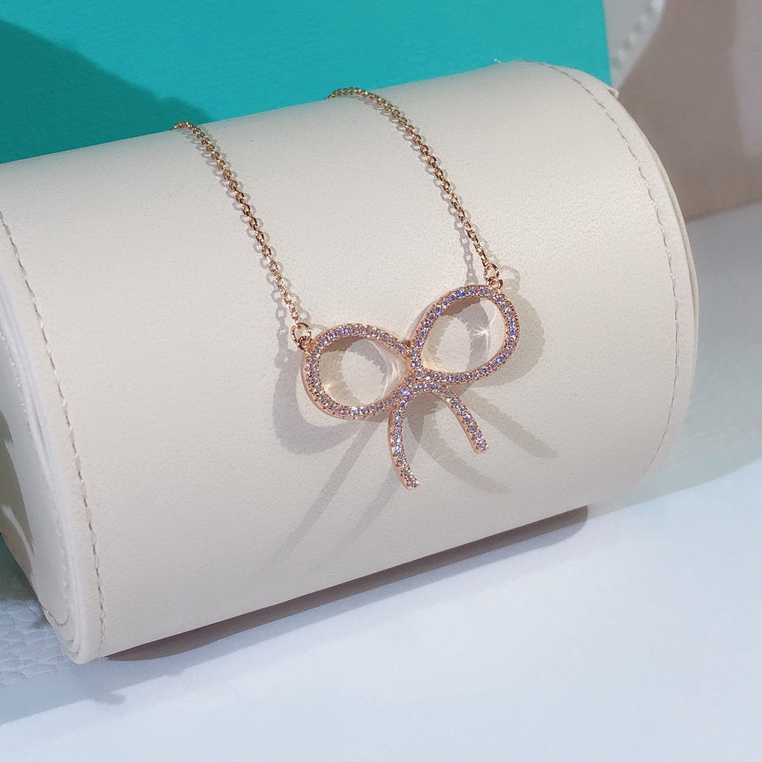[Marins]CLAW SET RHODIUM PLATED BOW NECKLACE
