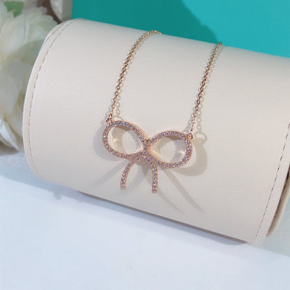 [Marins]CLAW SET RHODIUM PLATED BOW NECKLACE