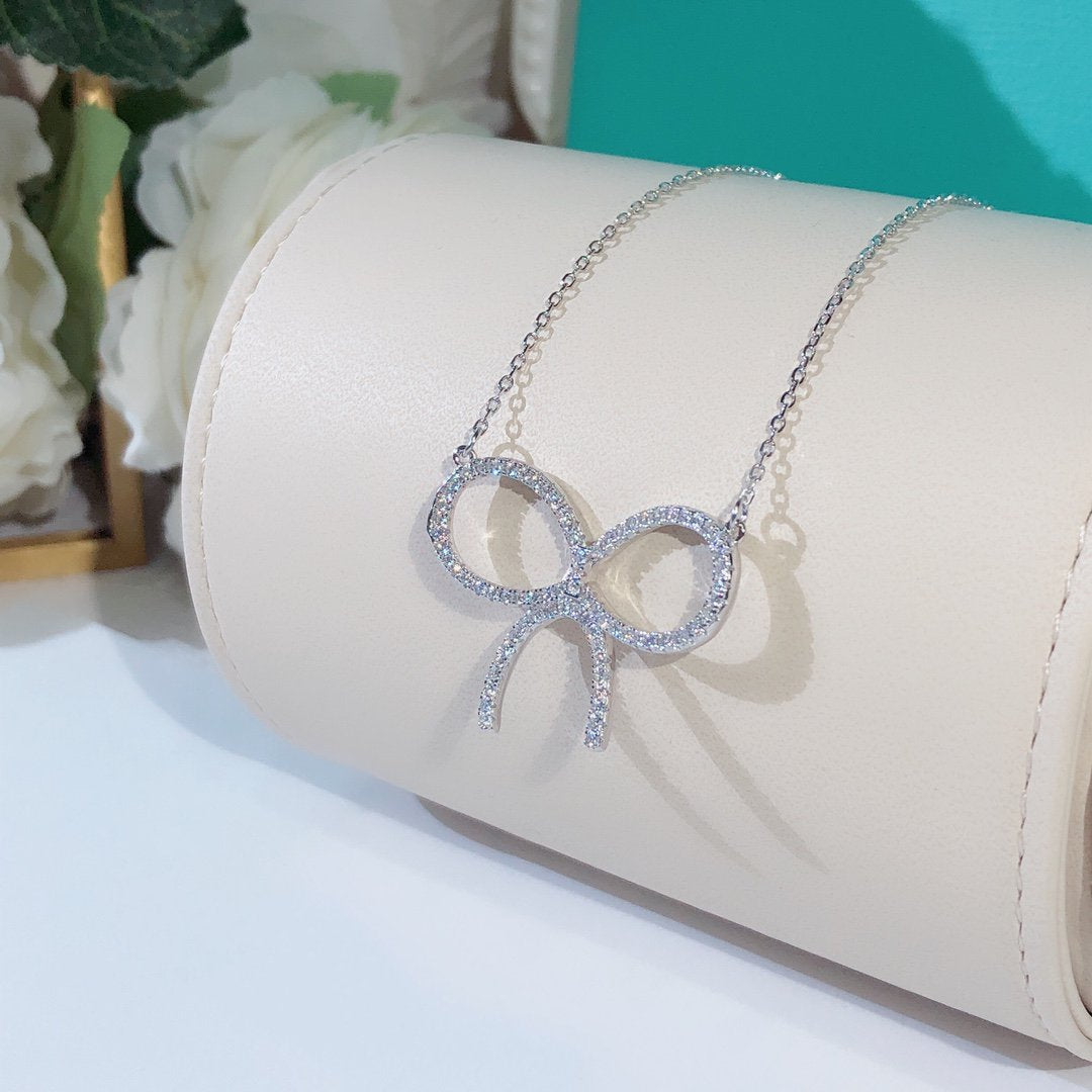 [Marins]CLAW SET RHODIUM PLATED BOW NECKLACE
