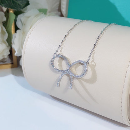 [Marins]CLAW SET RHODIUM PLATED BOW NECKLACE